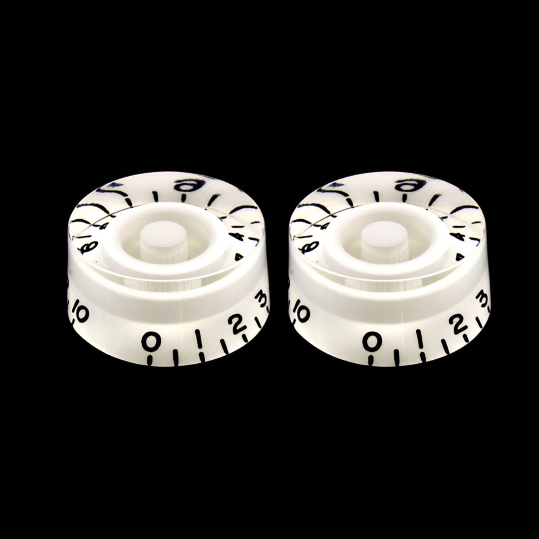 2 clear and white volume knobs