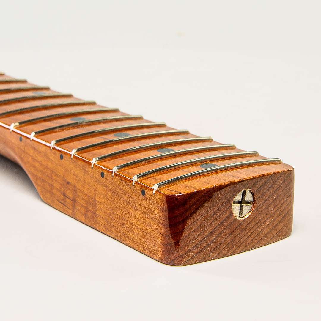 roast maple strat neck angled heel view