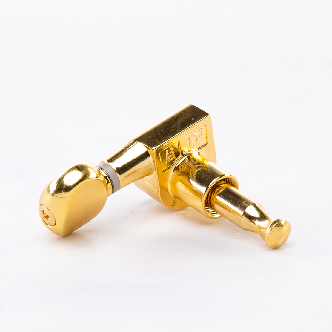 true tune 6 in-line single key back angled view gold
