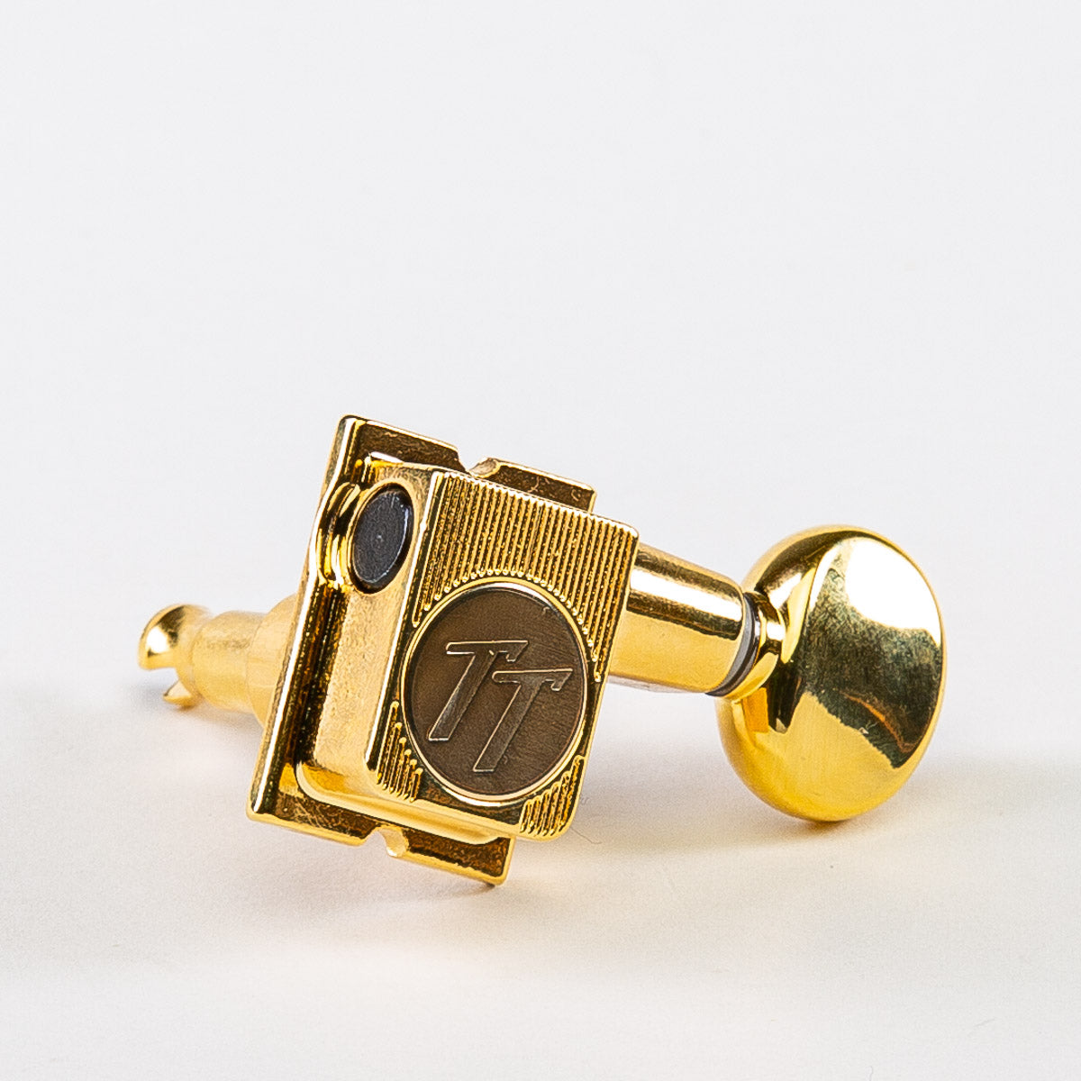 true tune 6 in-line keys w/ oval button single front view gold