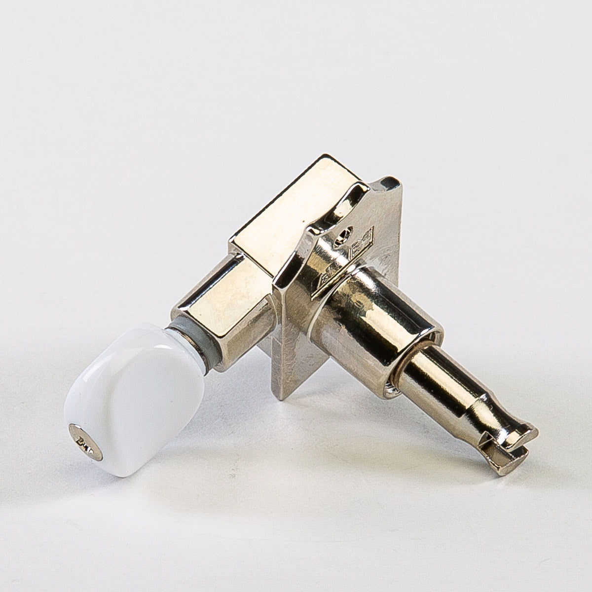 true tune 6 in-line keys w/ white plastic oval buttons single back view nickel