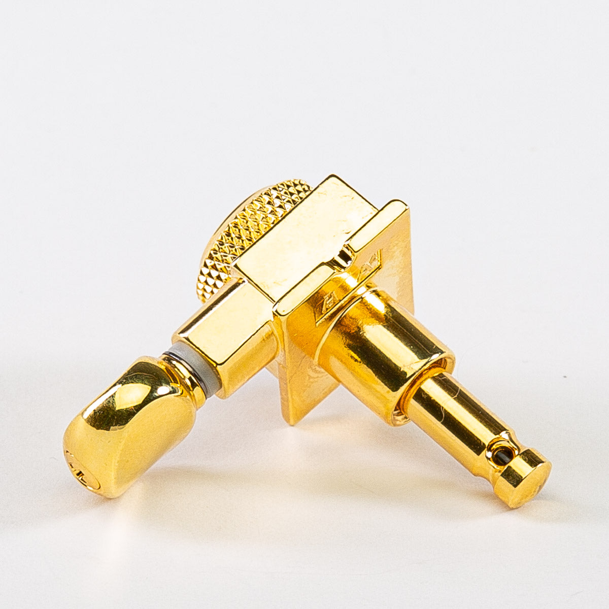 true lok 6 in-line staggered post locking keys w/ oval button single back view gold
