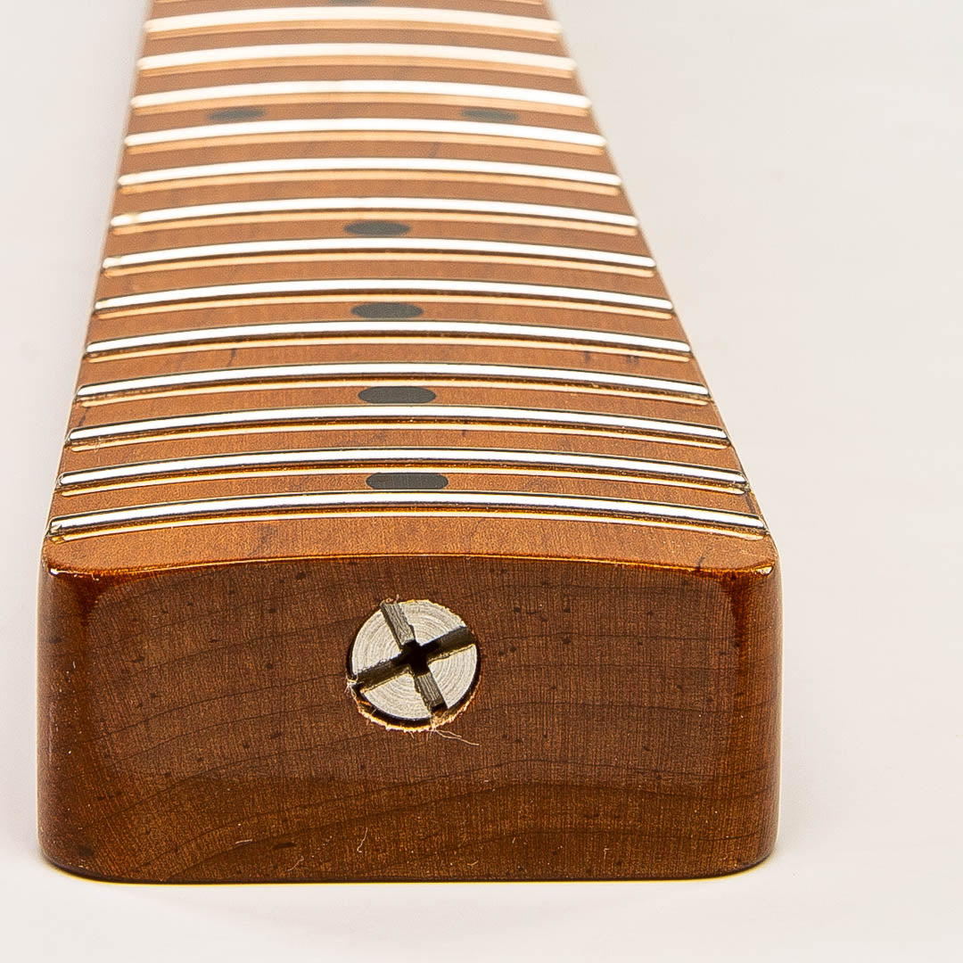 roasted flame maple tele neck heel view