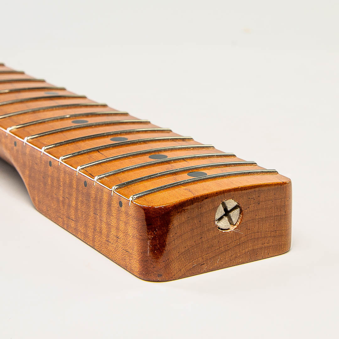 roasted flame maple tele neck angled heel view