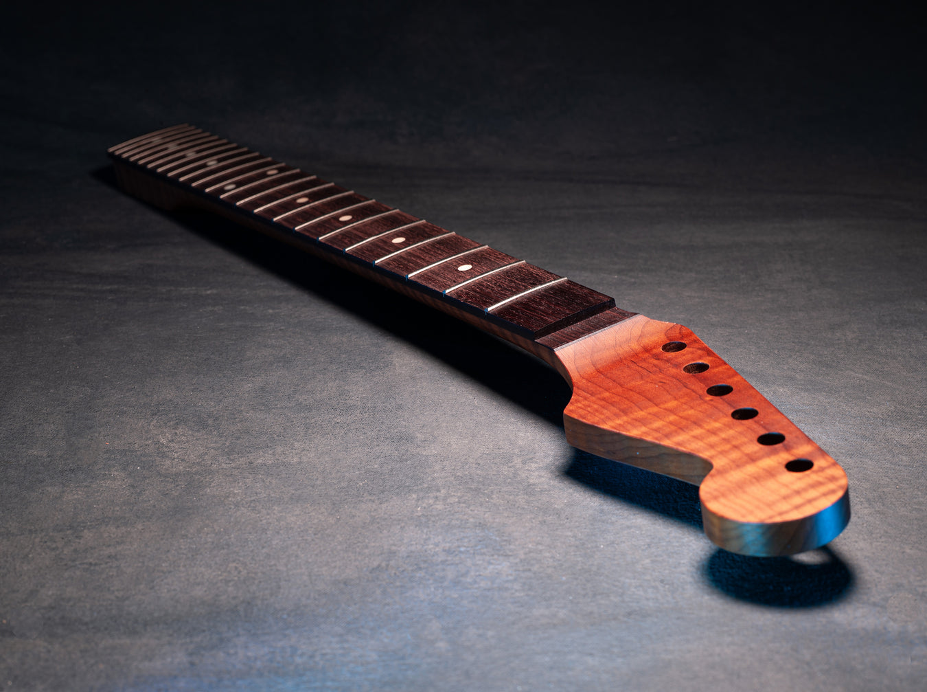 1 guitar neck facing forward