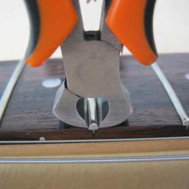 Fret puller in use