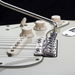 chrome close up view of Vegatrem 2-Point bridge on guitar