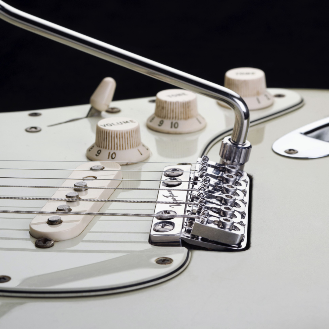 close up of chrome vegatrem bridge on guitar bridge angeled up