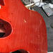 red guitar with clear coat