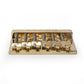 Badass HT1 guitar bridge front flat view gold finish