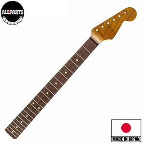 roasted maple strat neck with rosewood fretboard front diagonal view with badges