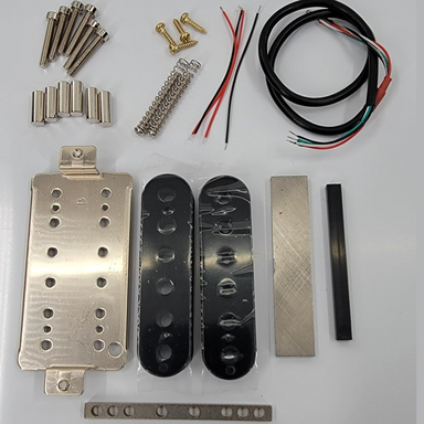 humbucking pickup kit with screws, wire, springs, magnets, spacer, bobbins, and bar