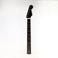 Rosewood colored guitar neck front view