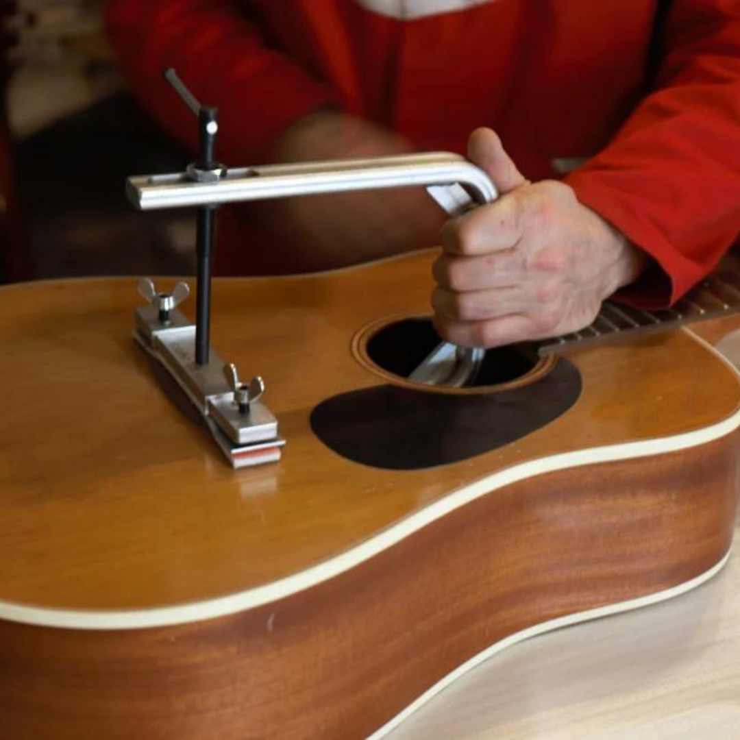 Fast Bridge c-clamp and caul in use on acoustic guitar