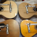 4 guitars all with the fast bridge clamp on