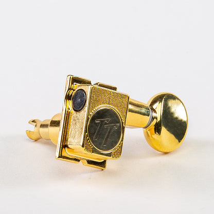 true tune 6 in-line staggered post keys w/ oval button single front view gold