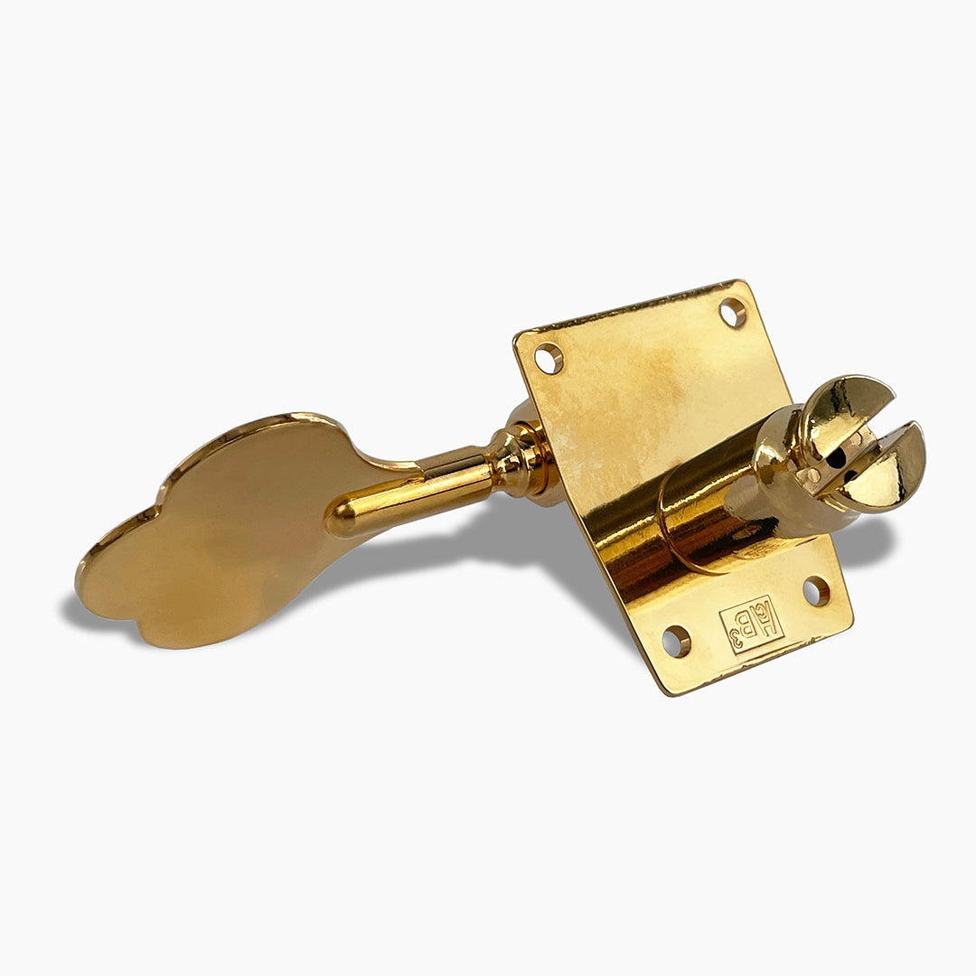 backside of one inline gold bass key