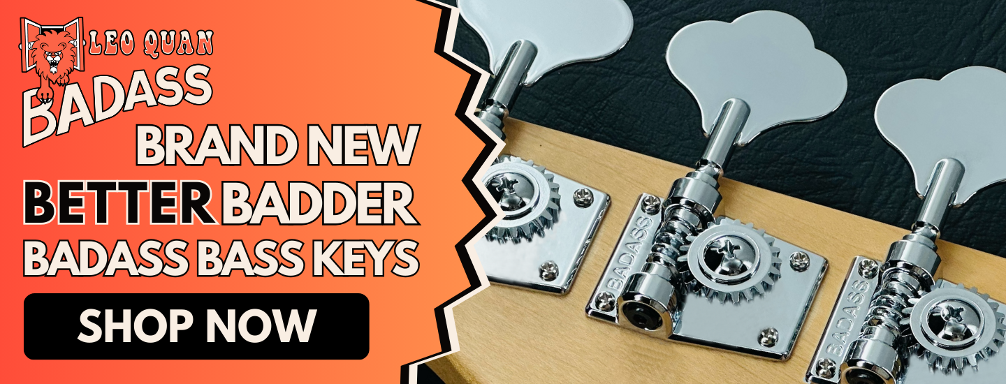 close up of the bass keys on a BADASS brand bass guitar with the words "brand new better badder badass bass keys shop now"