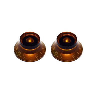 two bell knobs volume 0 to 11 amber