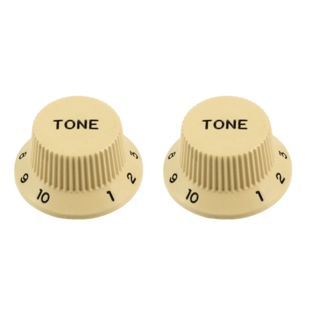 2 cream knobs with the word "tone"