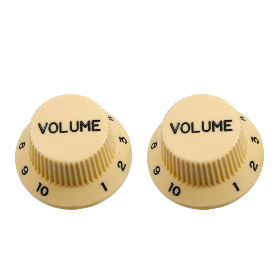 two cream volume knobs 