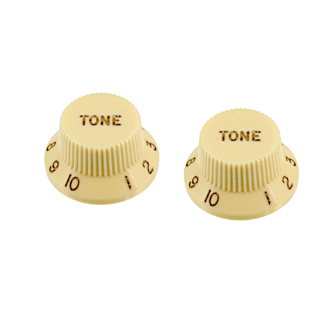 two dark cream knobs with the word "tone"