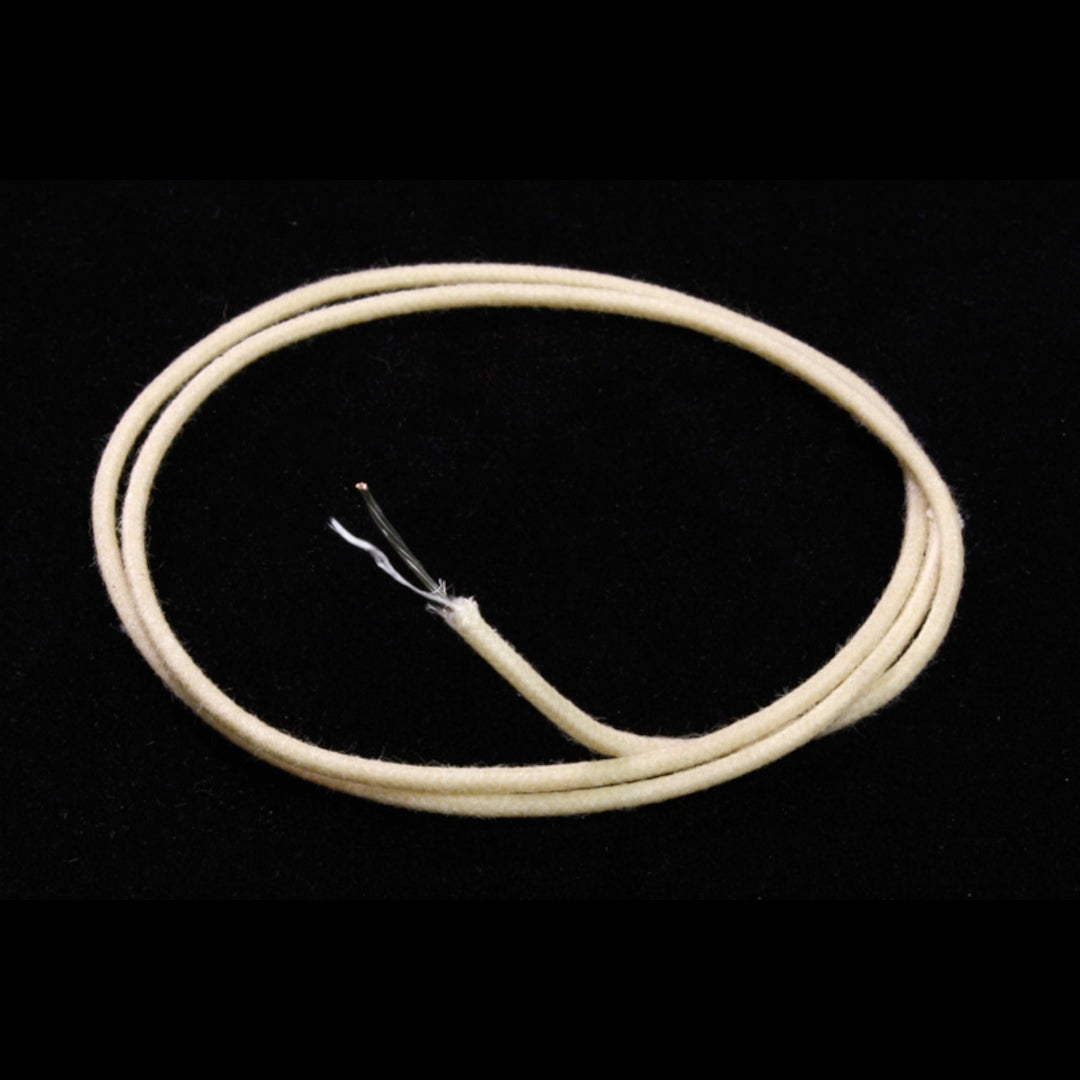 white cloth covered wire