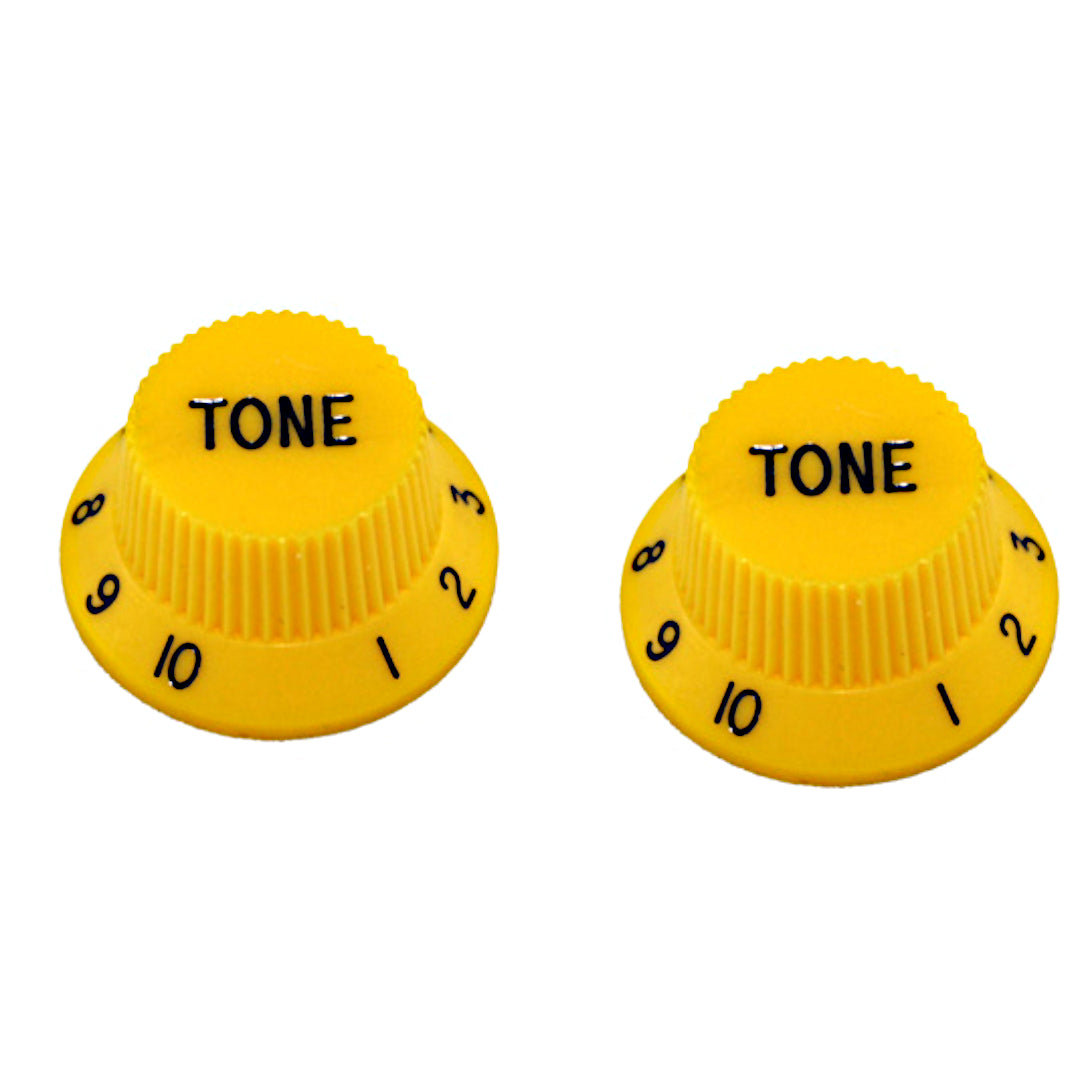 two yellow tone knobs