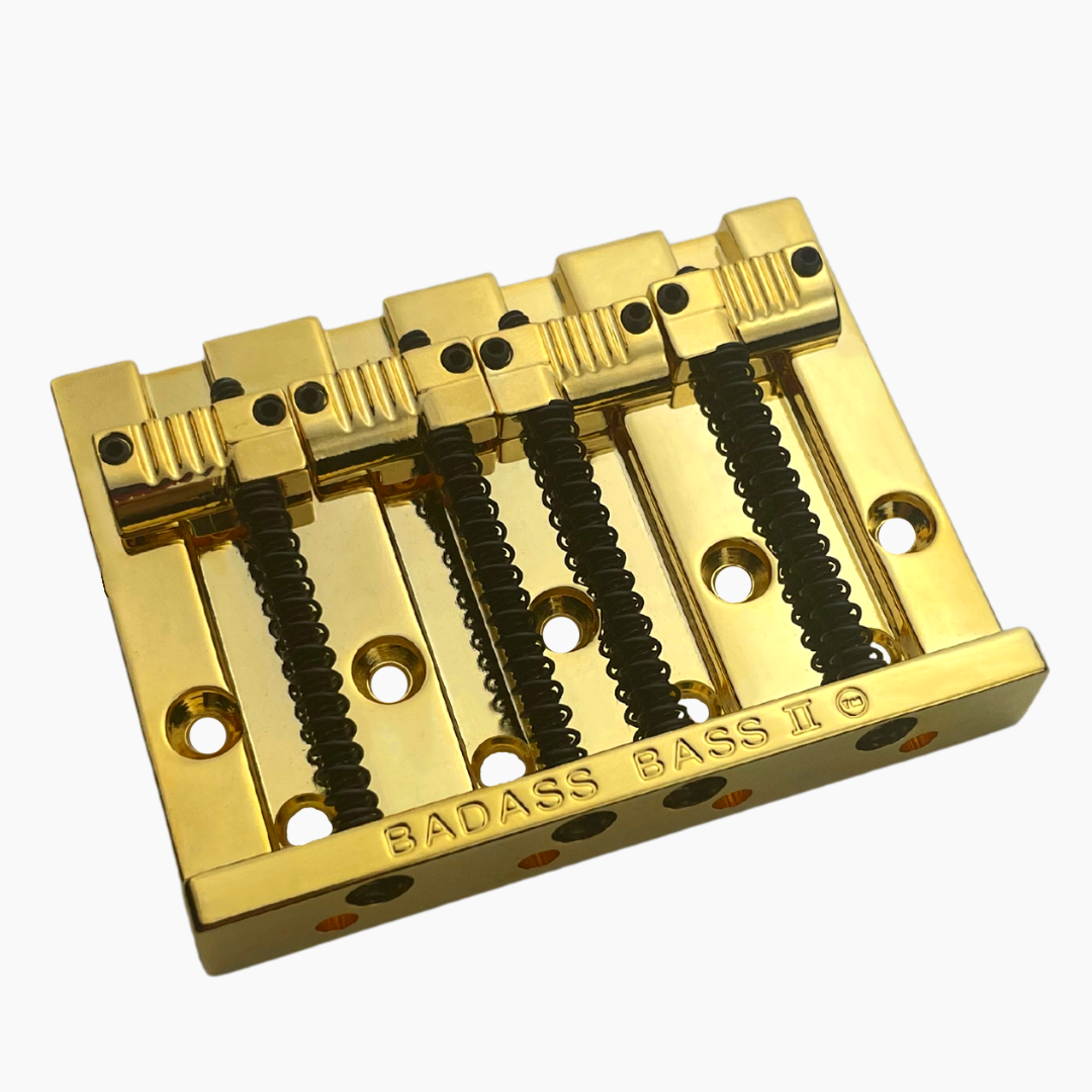 gold 4-string bass bridge with  grooved saddles