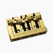 angled front view of gold 4-string bass bridge version 3 with grooved saddles