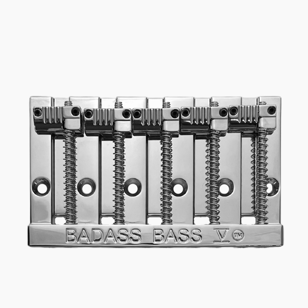 chrome front view of 5-string bass bridge with grooved saddles