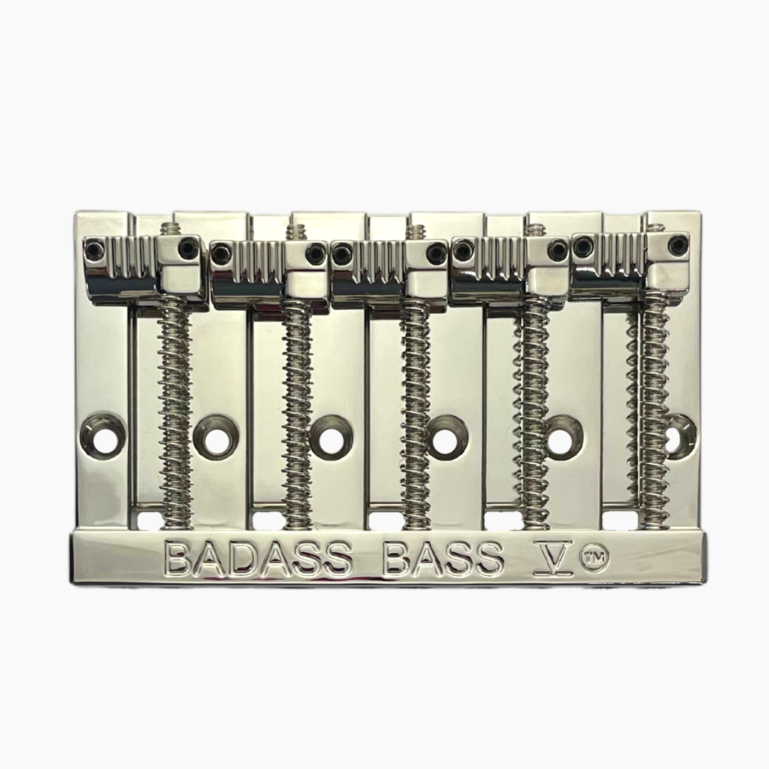 nickel front view of 5-string bass bridge with grooved saddles