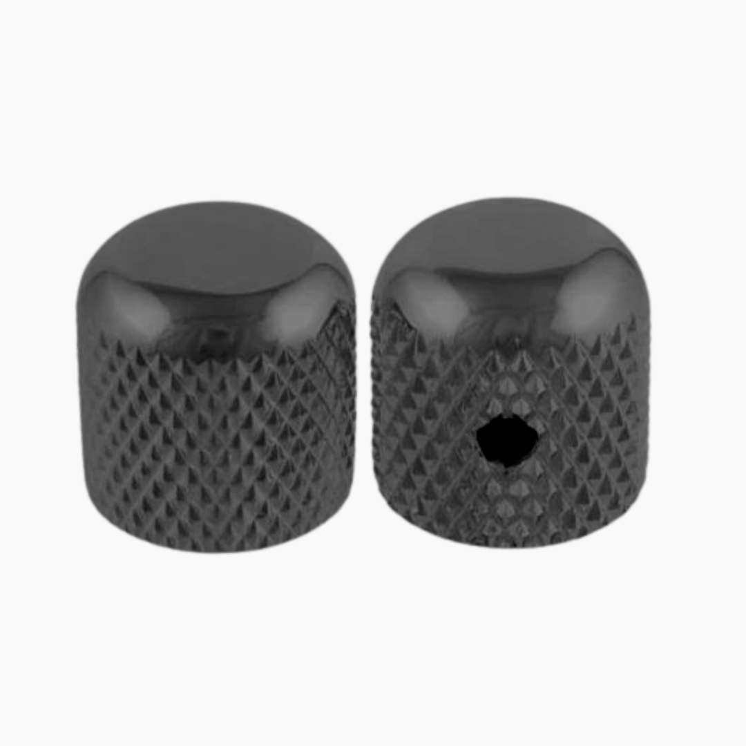 two black metal dome knobs facing opposite directions